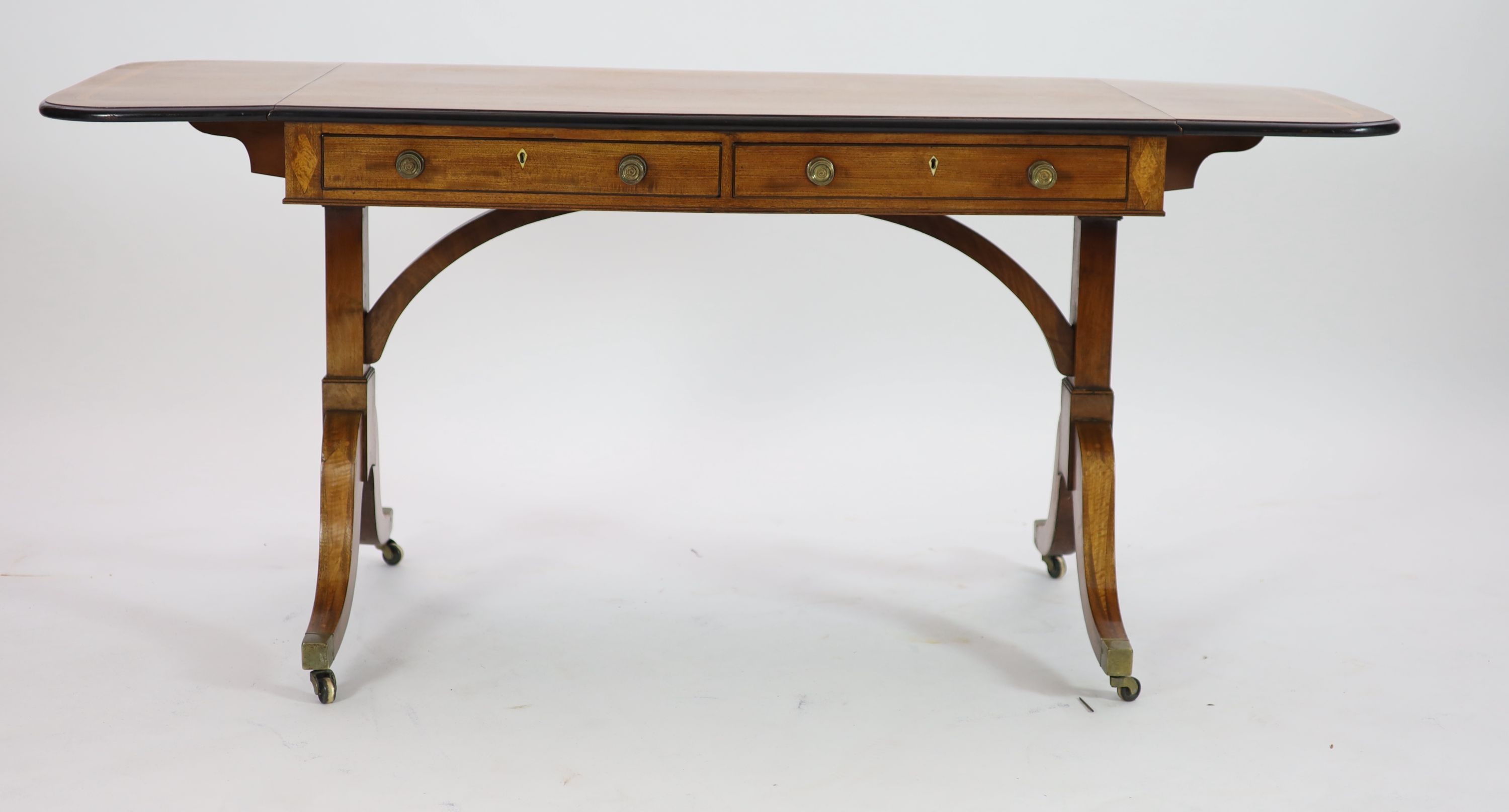 A late George III satinwood banded mahogany sofa table, W.108cm D.59cm H.74cm